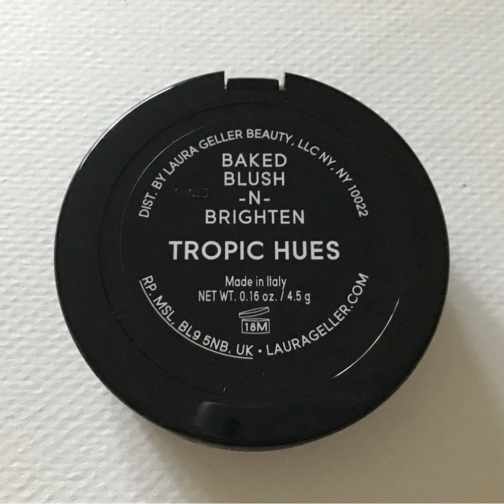 Laura Geller Blush-N-Brighten in TROPIC HUES, swirls of coral, pink, and…